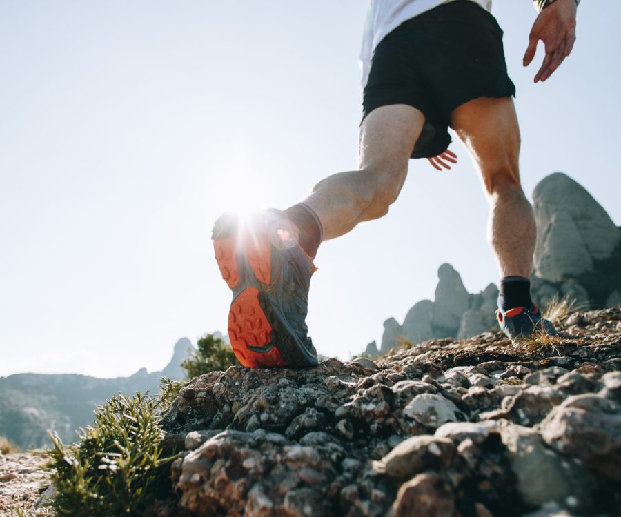 Cool man with tattoos ultra trail runner